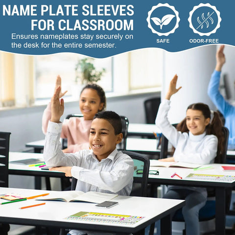 Children in classroom with name tag sleeves on desks, Thick Clear Desk Name Tag Pockets Set Of 40 With Stays Put Adhesive Backing