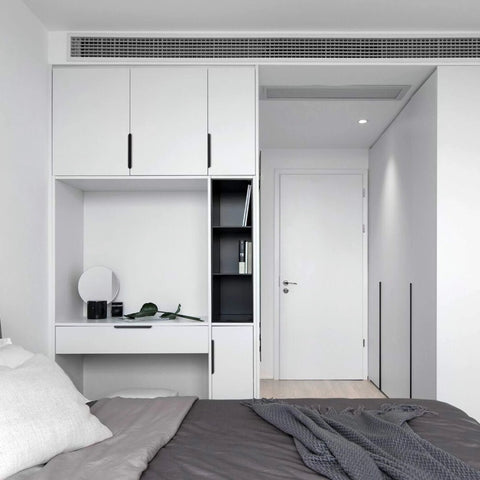 Modern bedroom with Matte Black Dresser Drawer Pulls 5 Pack Square Bar Cabinet Handles on white wardrobe and desk.
