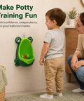 Cute Green Frog Potty Urinal For Toddlers Featuring Playful Aiming Target helps with easy potty training in bathroom.