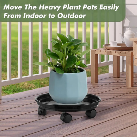 6 Pack Heavy Duty Plant Caddies With Wheels, Smooth Rolling Plant Dollies For Indoor Outdoor Potted Plants, Sturdy Black Plastic Saucers With Glide Casters on a patio with a blue potted plant.