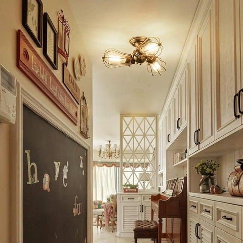 Vintage Industrial Ceiling Light With Metal Wire Cage Shade installed in hallway, rustic bronze finish, semi flush mount