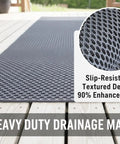 Heavy Duty Non Slip Floor Mat 4X10 Grey Drainage Rubber Deck Mat on wooden floor showcasing textured slip-resistant surface.