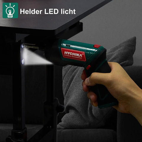 Hand using Cordless Electric Screwdriver With 6Nm Torque And 2000mAh Battery USB Quick Charge under table with LED light