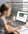 Slim Intel N150 Laptop With 15.6 Inch Fhd Display And 8Gb Ddr5 Ram, used by student writing notes at desk.