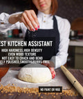 French Rolling Pin For Baking With Tapered Beech Wood Design, Nonstick Dough Roller next to dough being kneaded in kitchen