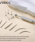 Piercing Taper Ball Grabber Tool And Jewelry Changing Kit 16G 18G 20G Surgical Steel parts on beige surface