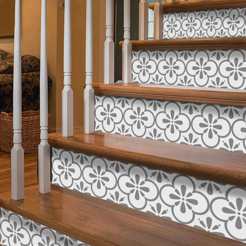 Close-up of stairs with 14 Strips Peel And Stick Stair Riser Decals Self Adhesive Vinyl Stickers For Steps Grey Clover Color 39.37 By 7.09 Inches