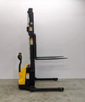 Built Tough Electric Wide Leg Pallet Stacker Heavy Lifter With 2204 Lbs Capacity And 130 Inch Lift, side view showcasing lift arms.