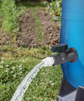 Rain Barrel Spigot Kit For Water Barrels PVC 3/4 Inch Spigot With Bulkhead Fitting Hose Adapter And Thread Seal Tape Fits Standard Faucets And Garden Hoses 2 Pack installed on a blue rain barrel with water flowing