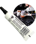 Silicone Dielectric Grease 10g for automotive and marine use, shown in tube form with an application image on battery terminals.