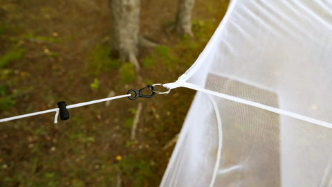Close-up of lightweight mesh canopy tie loop and hook from Rectangular Mosquito Net For Camping And Outdoors