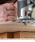 Pro Grade Badass Chamfer Router Bit Five Piece Set With One Quarter Inch Shank and Three Flute Twin Pilot Bearing Carbide Tips in use on wood.