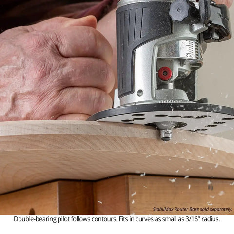Pro Grade Badass Chamfer Router Bit Five Piece Set With One Quarter Inch Shank and Three Flute Twin Pilot Bearing Carbide Tips in use on wood.