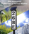 Solar Address Sign Lighted Outdoor House Numbers Plaque Waterproof No Fuss Setup displayed against weather backgrounds