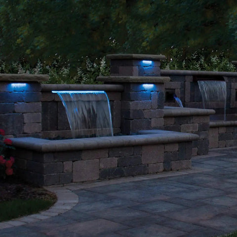 Outdoor wall with LED Color Changing Hardscape Light 6-Inch Multicolored With Oil Rubbed Bronze Finish And Solid Brass Construction