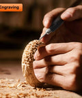 Close-up of hands using 141-Piece Rotary Tool Accessories Kit With 1/8-Inch Shank Universal Fitment for engraving wood