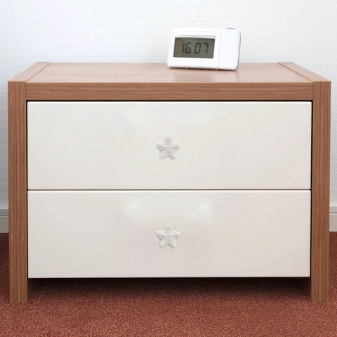 Wooden dresser with white drawers featuring Star Shaped Ceramic Cabinet Pull Handle White Knob For Wardrobe And Dresser Drawers Smooth Ergonomic Grip Vintage Style Drawer Pull For Kitchen And Furniture.