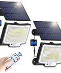 2 Pack Outdoor Solar Motion Lights With Remote, 3 Modes, 228 LED Flood Lights IP65 Waterproof, showing solar panels and remote.