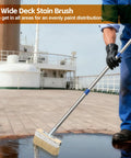 Worker using Long Handle Deck Stain Brush With 64 Inch Adjustable Shaft And 8 Inch Paint Brush Included on ship deck