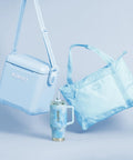 Powder Blue 11 Qt Tag-Along Two Strapped Picnic Style Cooler with Hands Free Crossbody Strap, bag, and tumbler set