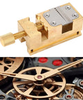 Close-up of Brass Watch Repair Vise Clamp Kit With 0.2-1.5mm Hole Range and gears, showcasing precision and detail.