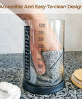 Hand cleaning 34oz jar from Pro Sourdough Bread Starter Kit With 34 Oz Jar Funnel Opening Silicone Cover And 5 Handy Features