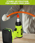 Cordless 18V Heat Gun With 350W Power, LED Light, Quick Heat In Seconds, Variable Temperature 120 To 122°F, Includes 4 Nozzles And Scraper, Low Voltage Protection, Great For Crafts And DIY Projects Battery Not Included. Stand-up cordless heat gun heating orange tubing.