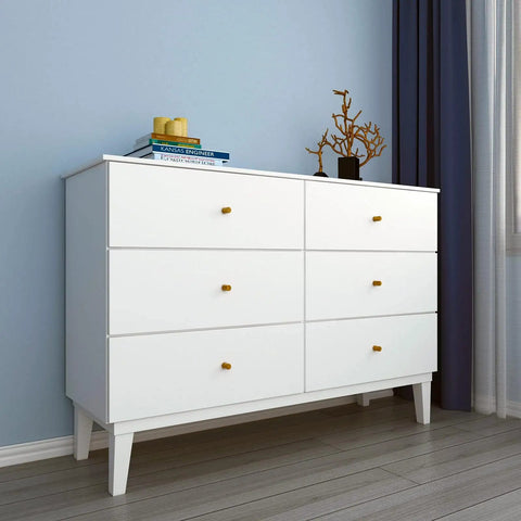 White dresser against blue wall, decorated with books and vase, emphasizing White Contact Paper Peel And Stick Wallpaper For Cabinets And Walls Self Adhesive Matte Vinyl Wrap Thick Durable Film Removable Grid Printed Back For Easy Cuts 30 By 120 Inches on wall surface.