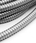Close-up of Half Inch Flexible Electrical Conduit Fifty Foot Galvanized Iron For Home And Industrial Wiring Protects Wires From Impact