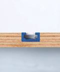 Cross-section view of wood with blue 36 Inch Aluminum T Track Set with predrilled holes against white background.