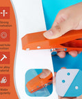 Handheld Single Hole Puncher for Paper and PVC, heavy duty edge banding tool with limiter, 5/16 inch punch in use, zinc alloy body