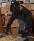 Heavy Duty Welding Cape Sleeve Made From Tough Split Cowhide Leather Flame Resistant Welder Jacket in action with sparks flying.