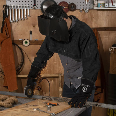 Heavy Duty Welding Cape Sleeve Made From Tough Split Cowhide Leather Flame Resistant Welder Jacket in action with sparks flying.
