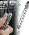 Close-up of stainless steel wheel alignment pin with M14x1.5 thread, knurled grip, used for steadying wheels during alignment.