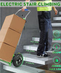 Heavy Duty Electric Stair Climbing Hand Truck With Upgraded Rubber Tracks And Height Adjustable Tray Carrying 900 Pounds Lithium Battery And Safety Rope Perfect For Moving Warehouse Or High Rise Buildings In Green, transporting boxes up stairs.