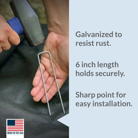 Person installing Beefy 200 Pack Garden Landscape Staples Galvanized 6 Inch Pins Anti Rust 11 Gauge Steel For Weed Barrier Fabric