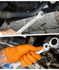 Using a One Quarter Inch Flex Head Ratcheting Wrench With Open End and Box End, 72 Tooth, for car repair and engineering work.