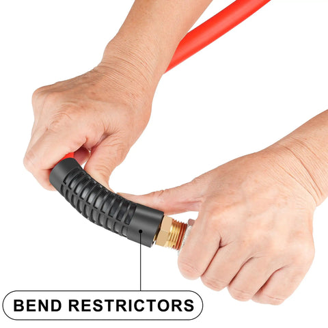 Hands connecting bend restrictors on Boss Level Heavy Duty Half Inch By Fifty Foot Hybrid Air Compressor Hose Rated At 300 Psi.