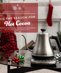 Cosori Gooseneck Electric Kettle 0.8 Liters Silver Precision Pour Over Coffee And Tea Maker on a table with holiday decor.