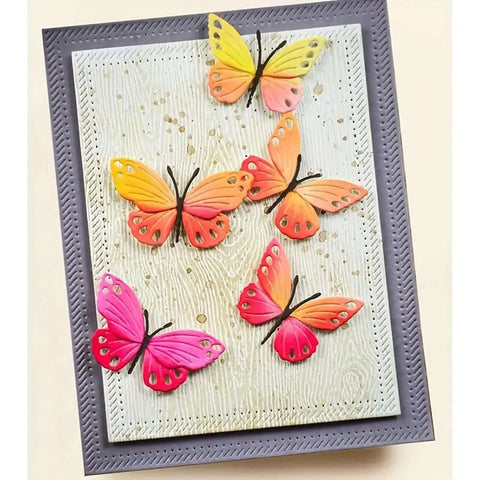 Colorful butterfly embellishments on a card made with Six Piece Rectangle Frame Metal Die Cuts Set With Scalloped Stitch Nested Tags.
