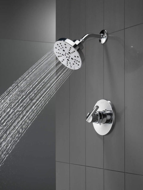 Nicoli 14 Series H2Okinetic Shower Faucet Set Chrome with shower head and handle trim kit installed against grey tiles