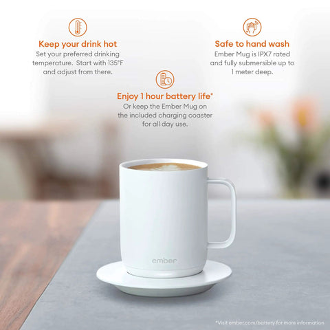 Keep Your Morning Brew Piping Hot With This App Controlled Smart Mug 10 Ounce White Heated Coffee Cup featuring a mug on a charging coaster.