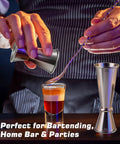 Hands using Stainless Steel Cocktail Jiggers 2 Pack Japanese Style Double Measuring Cups for bartending with cocktail