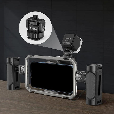 Lightweight Mini Ball Head Cold Shoe Mount Adapter With Quarter Inch 20 Thread for camera cage and LED video light setup.