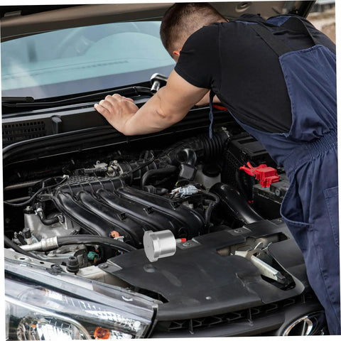 Mechanic installing Drift Ready Racing Car Oil Tank Hydraulic Reservoir Cup in car engine bay for track day drifts.
