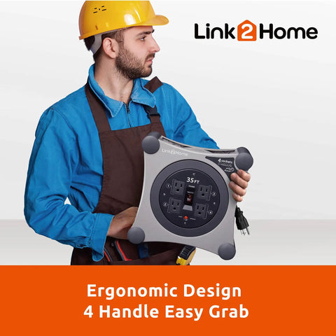 Built Tough Retractable Extension Cord Reel With Four Outlets And Circuit Breaker Protection 35 Foot Auto Rewind Design held by a worker in uniform.
