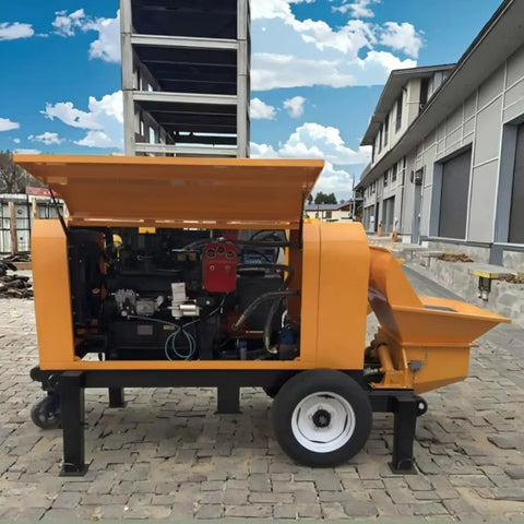 Powerful Portable Concrete Pump Machine With Advanced Hydraulic Drive System For Efficient Construction Site Material Transfer And Heavy Duty Conveying Solutions In Professional Settings, side view with engine exposed.