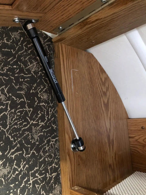 100N 22.5lb Gas Struts 10 Inch Lift Supports Set Of 4 For Lids And Doors installed in wooden cabinet