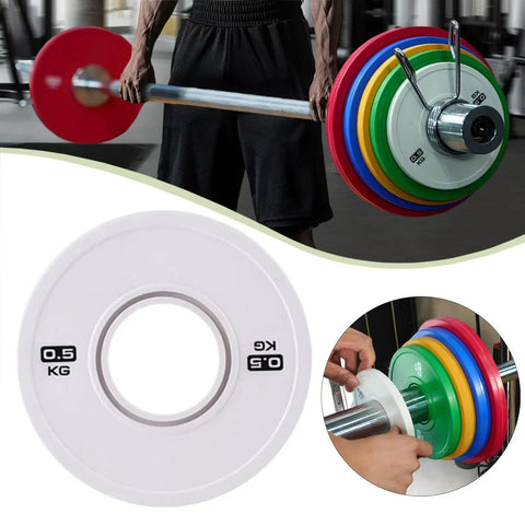 0.5 Kg Barbell Change Plate With Grooved Inner Design For Stable Lifts, White finish on barbell in gym setup