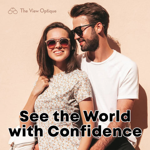 The View Optique sunglasses worn by a couple against a peach wall; logo visible at the top left.